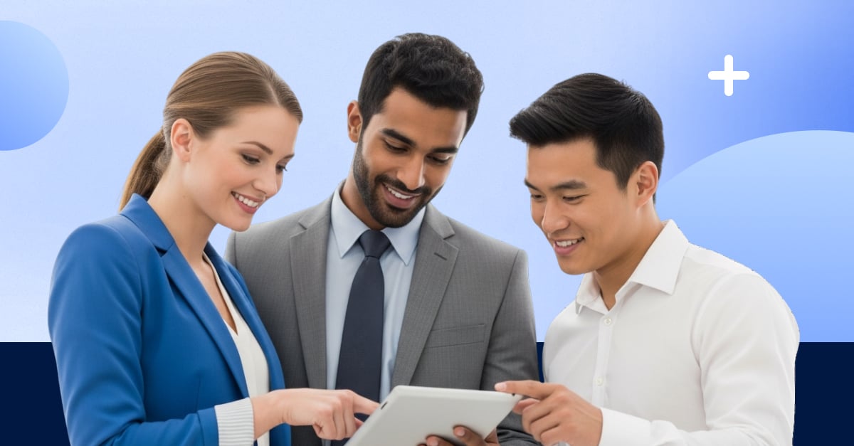 Three business professionals reviewing information on a tablet together, representing collaboration in vendor risk assessment and third-party risk management