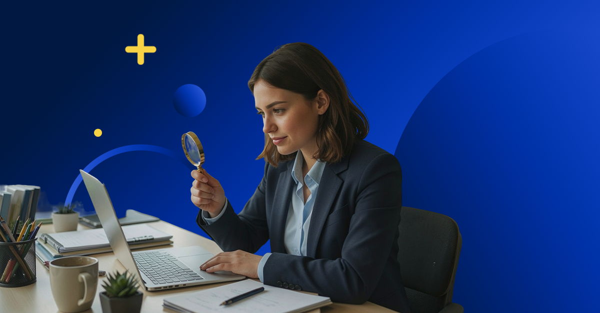 A compliance professional examining documents on a laptop with a magnifying glass, representing what the SEC found in an RIA annual compliance review alert and what to fix.